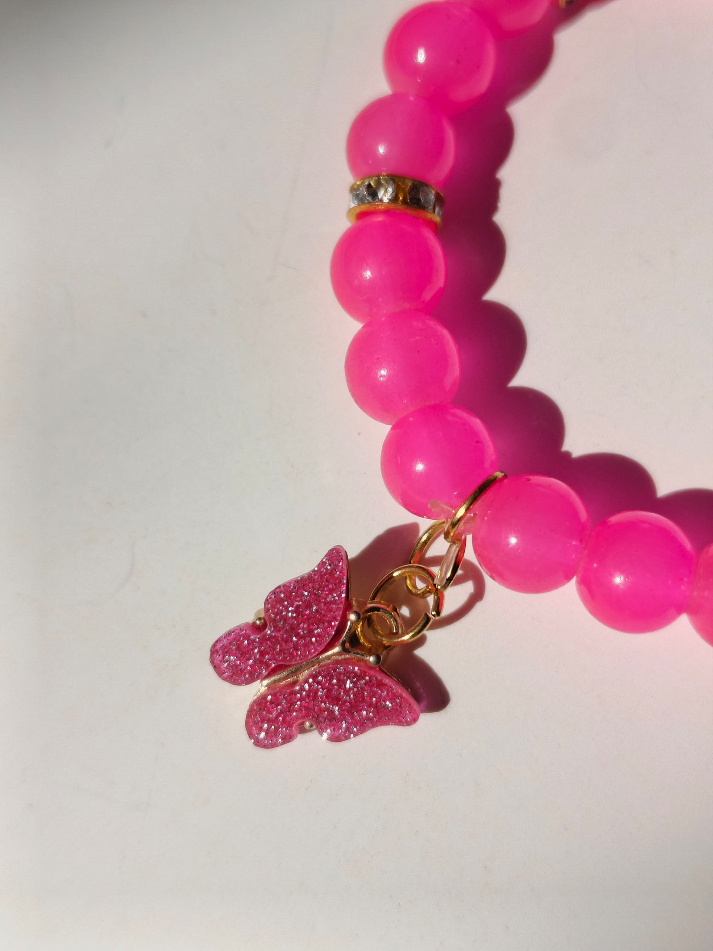 Pink butterfly charm bracelet