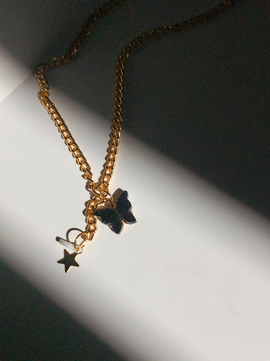 Midnight butterfly charm necklace