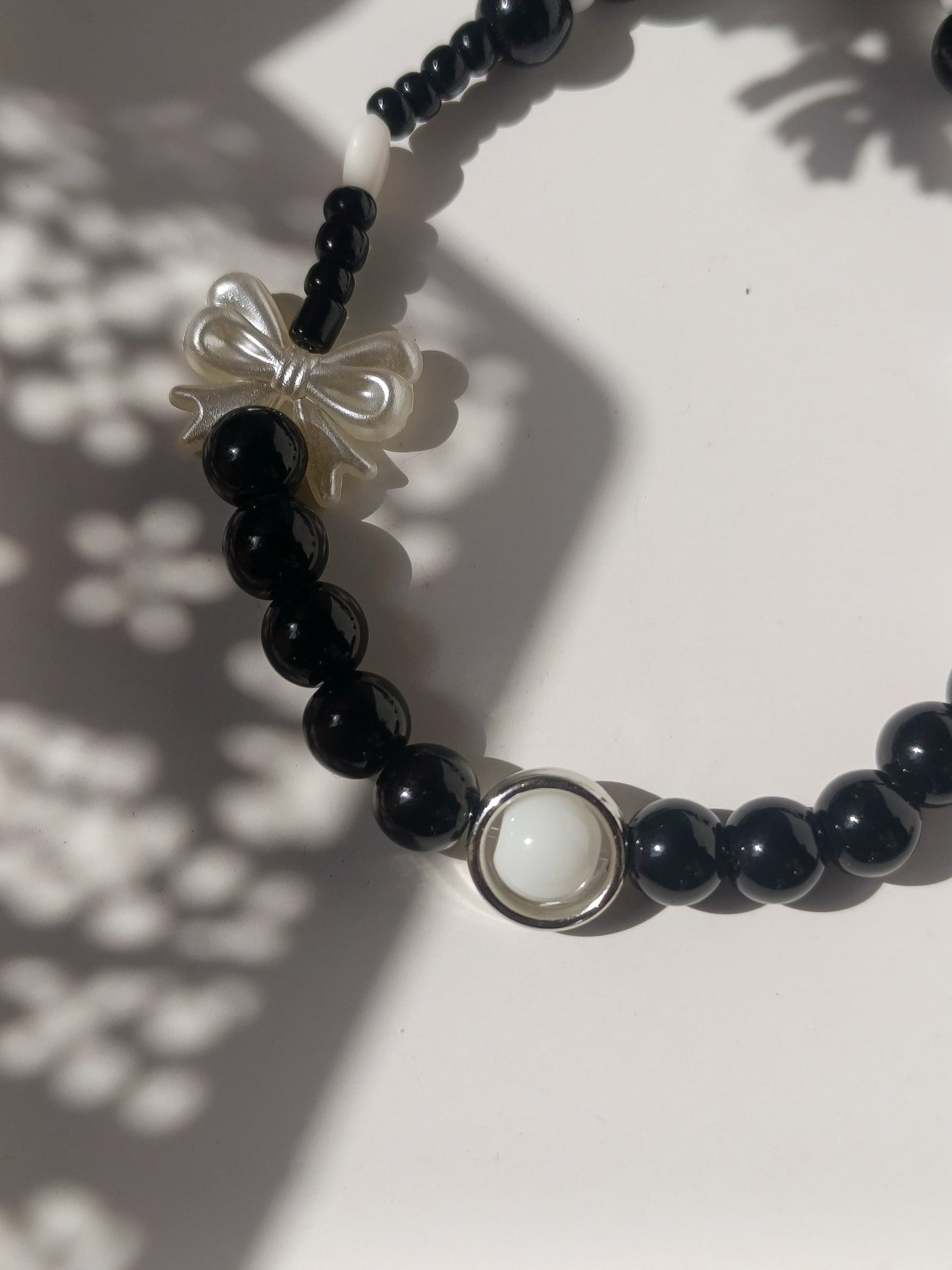 Balck beauty bow charm phone lanyard