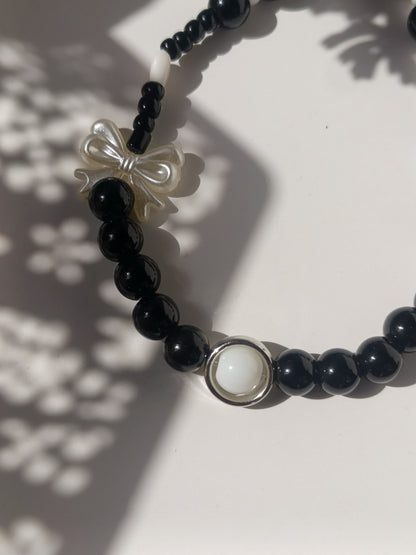 Balck beauty bow charm phone lanyard