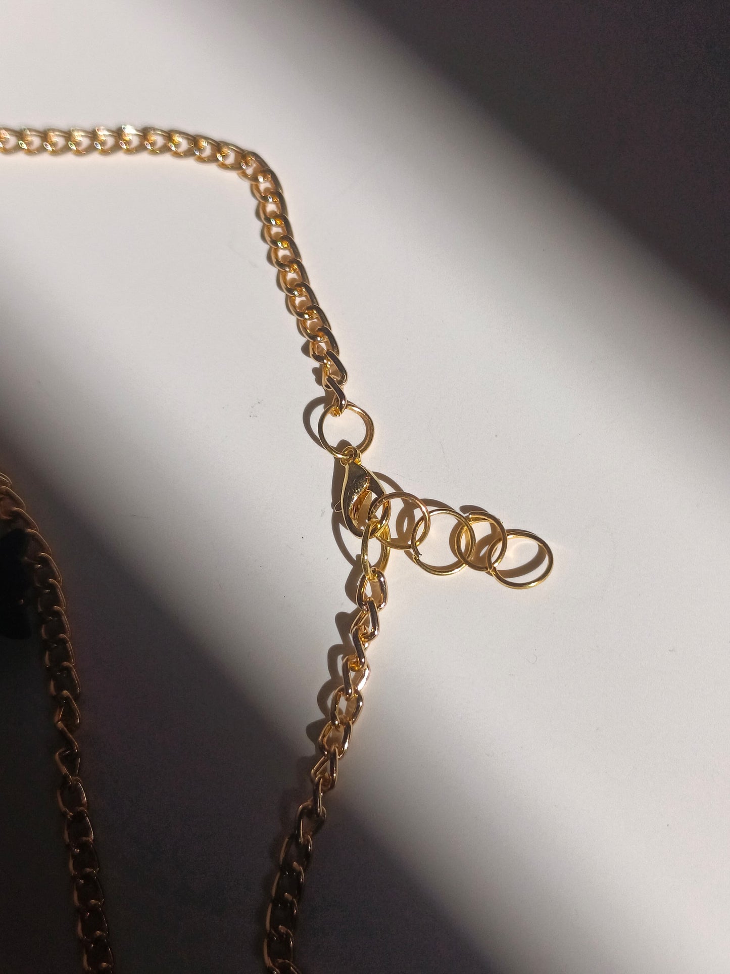 Midnight butterfly charm necklace