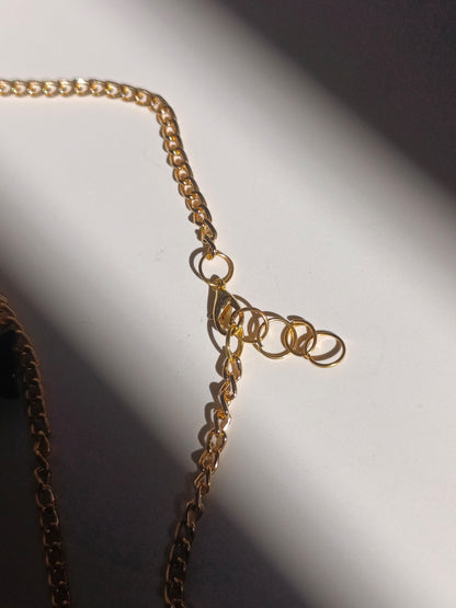 Midnight butterfly charm necklace