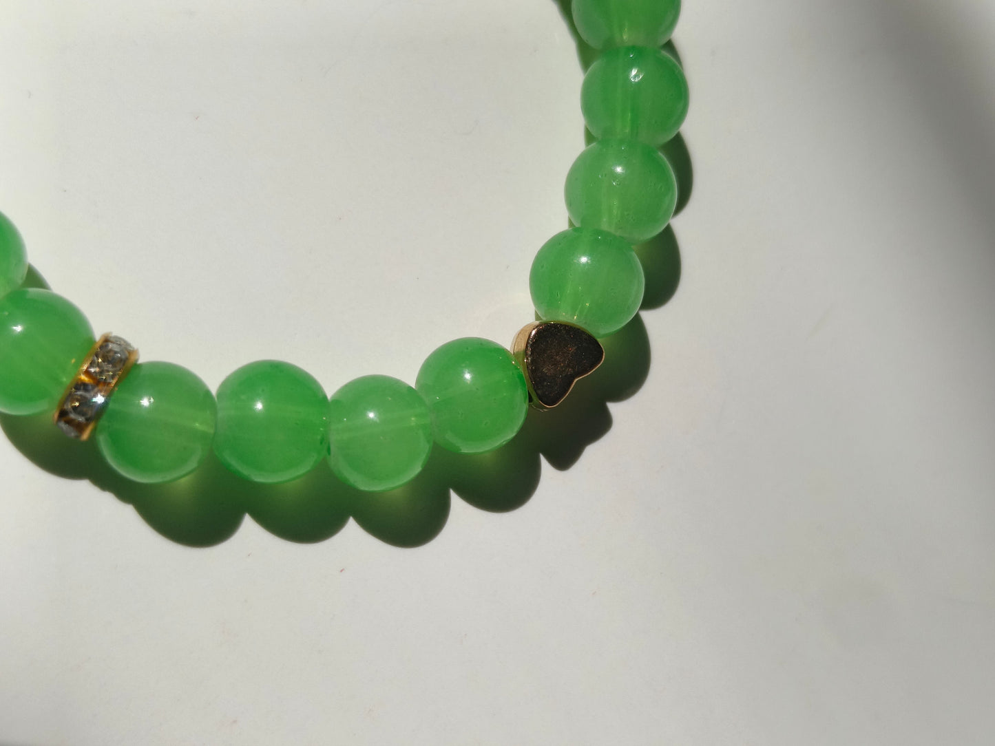 Emerald glow heart bracelet
