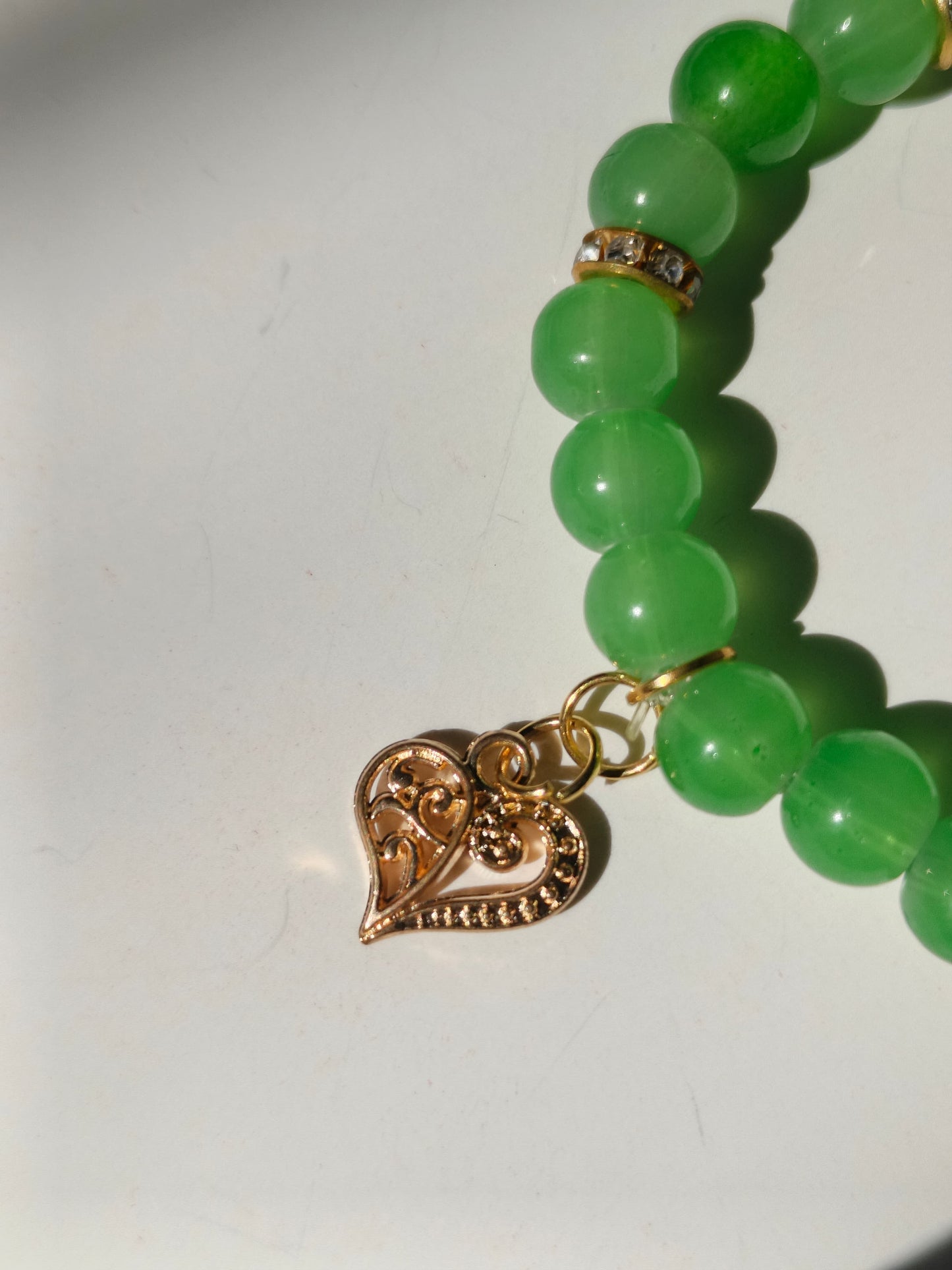 Emerald glow heart bracelet